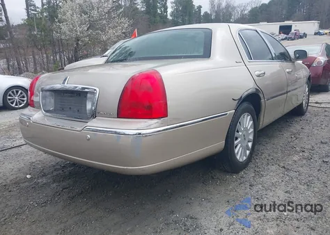 2005 Lincoln Town Car Signature z USA, uszkodzony, nr VIN 1LNHM81W75Y606604